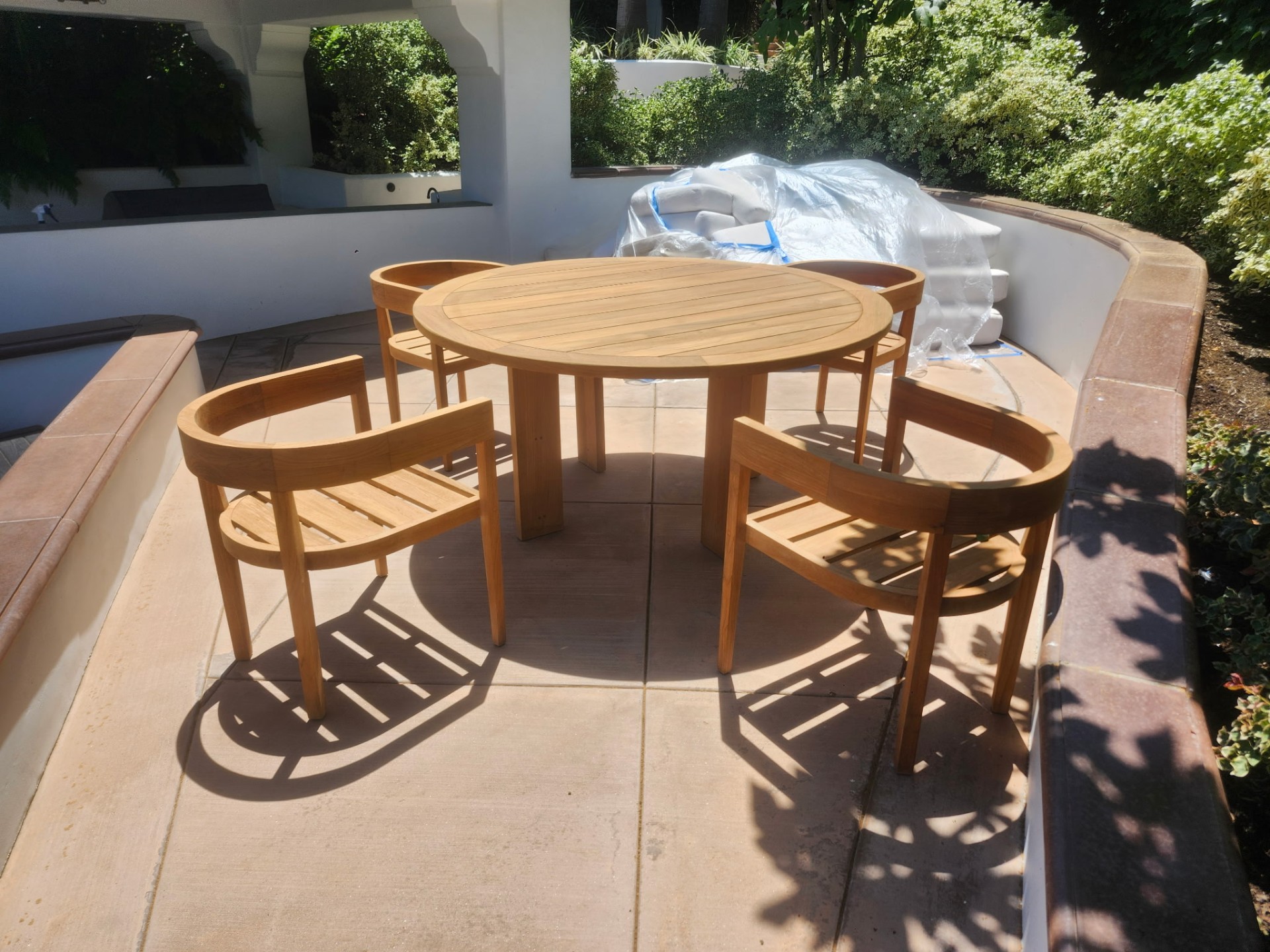 Round Teak Dining Set restored by My Teak Pro in Newport Beach, CA