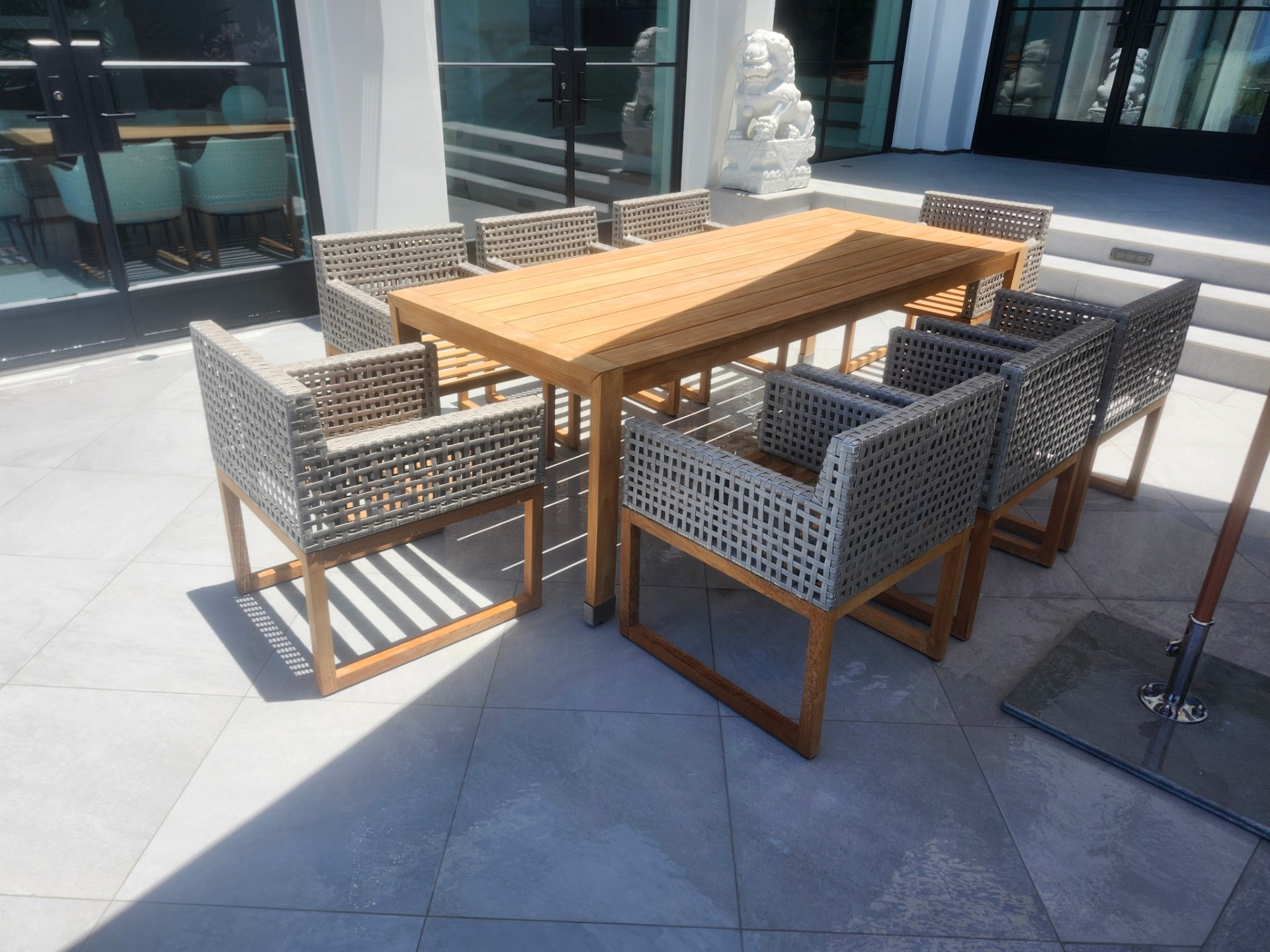 Restored luxury teak furniture overlooking the Pacific Ocean in Newport Beach