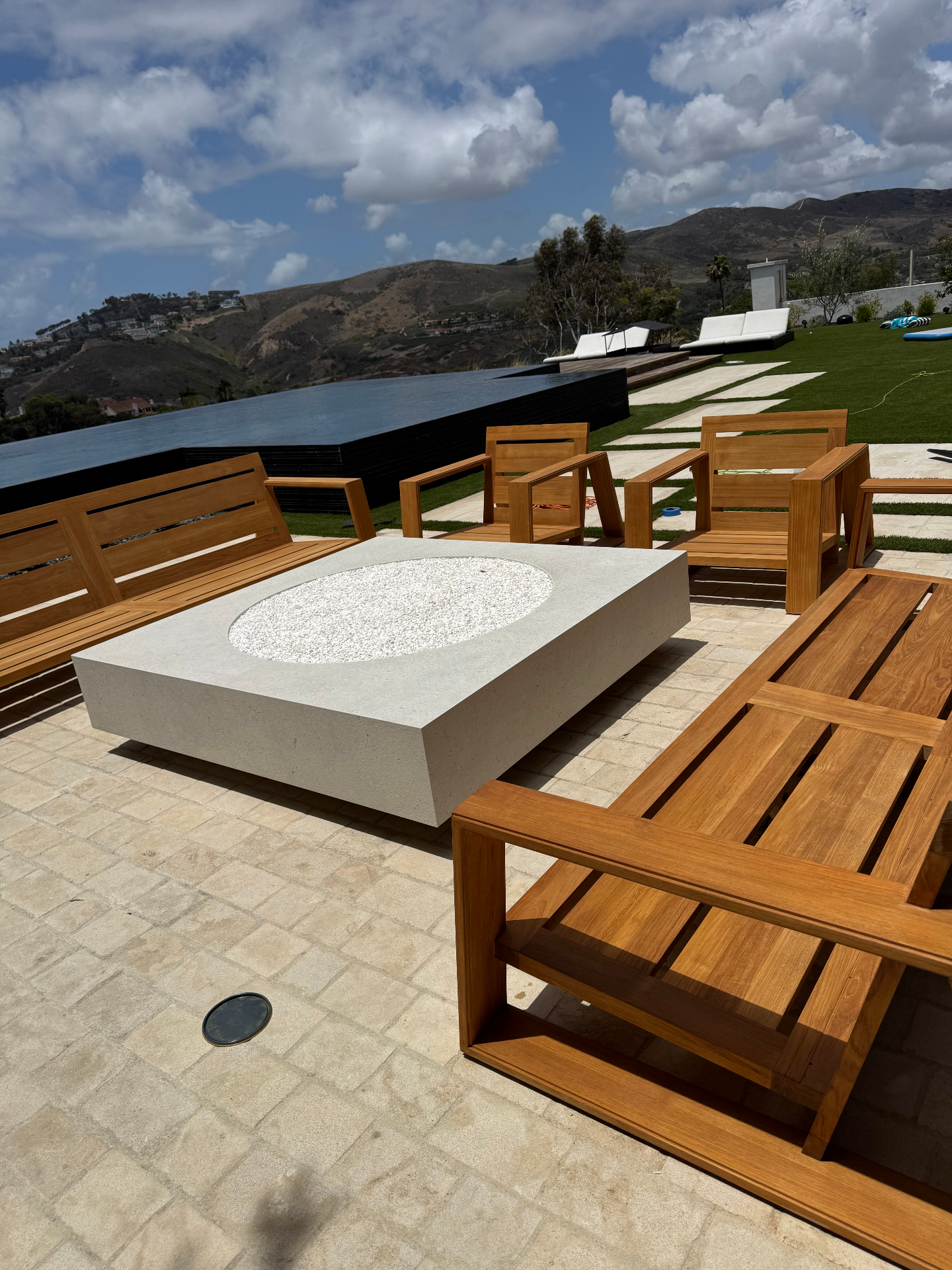Infinity-Edge Fire Lounge — teak restoration by My Teak Pro for a Newport Beach client, finished in Laguna Beach, CA